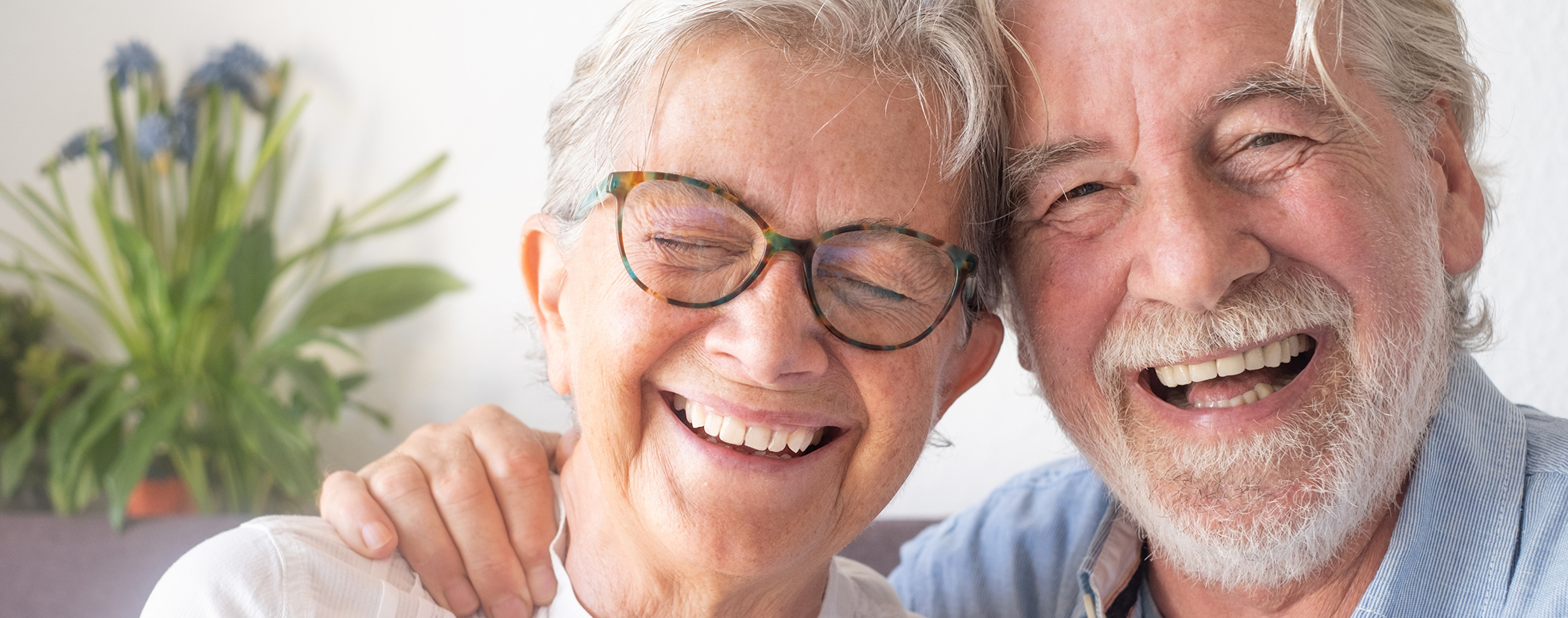 Senior couple smiling with dentures in Sterling Heights