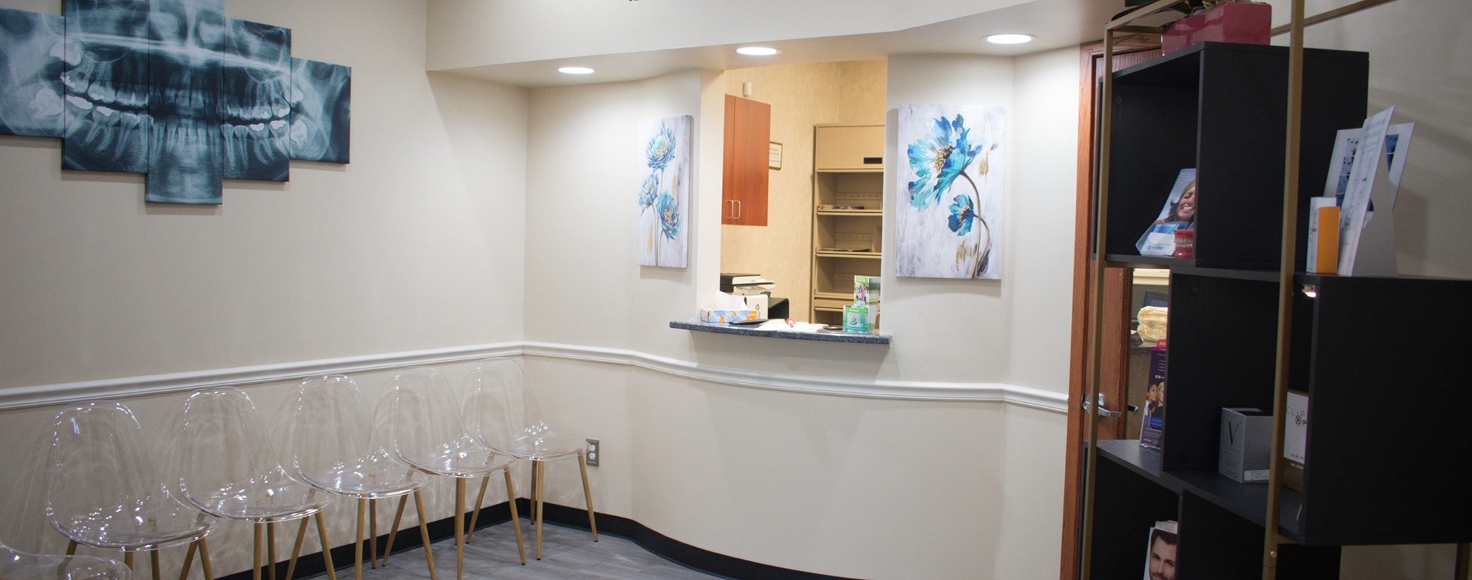 Front desk and reception area of a dental office in Sterling Heights