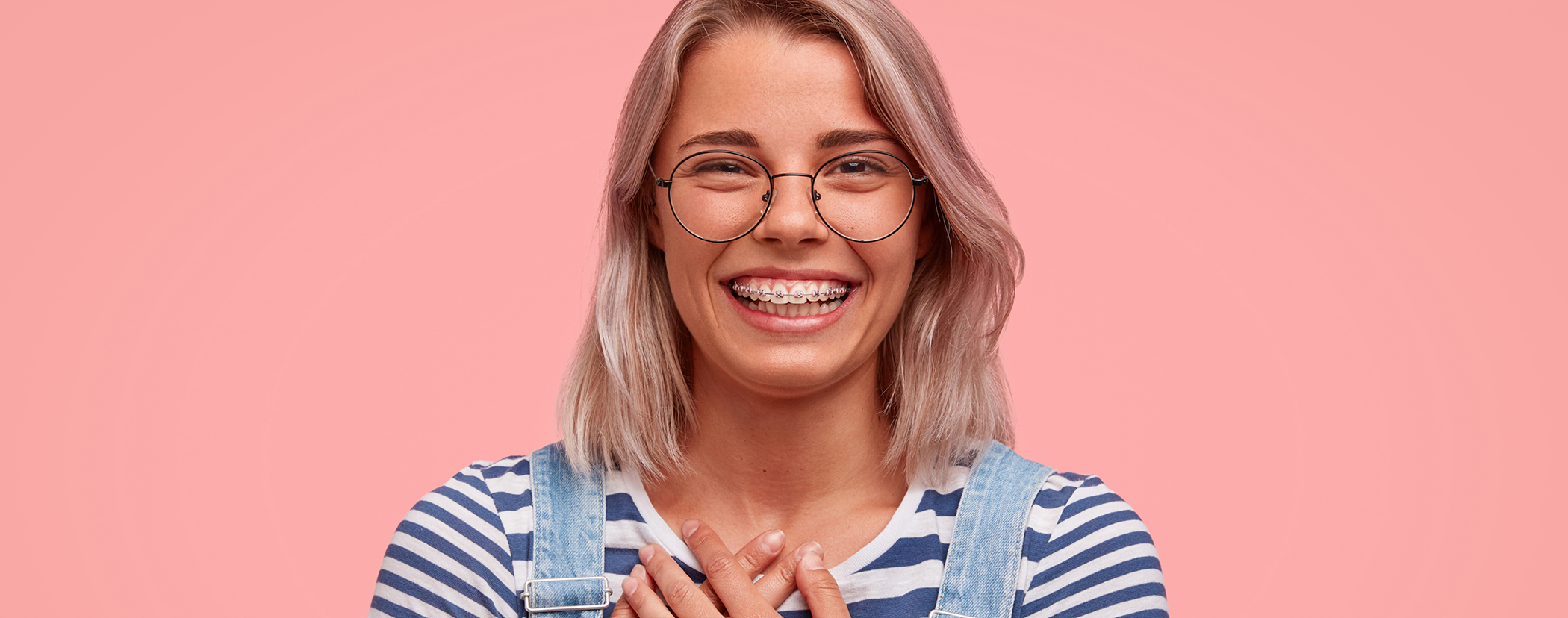 Teenage girl smiling with traditional braces in Sterling Heights